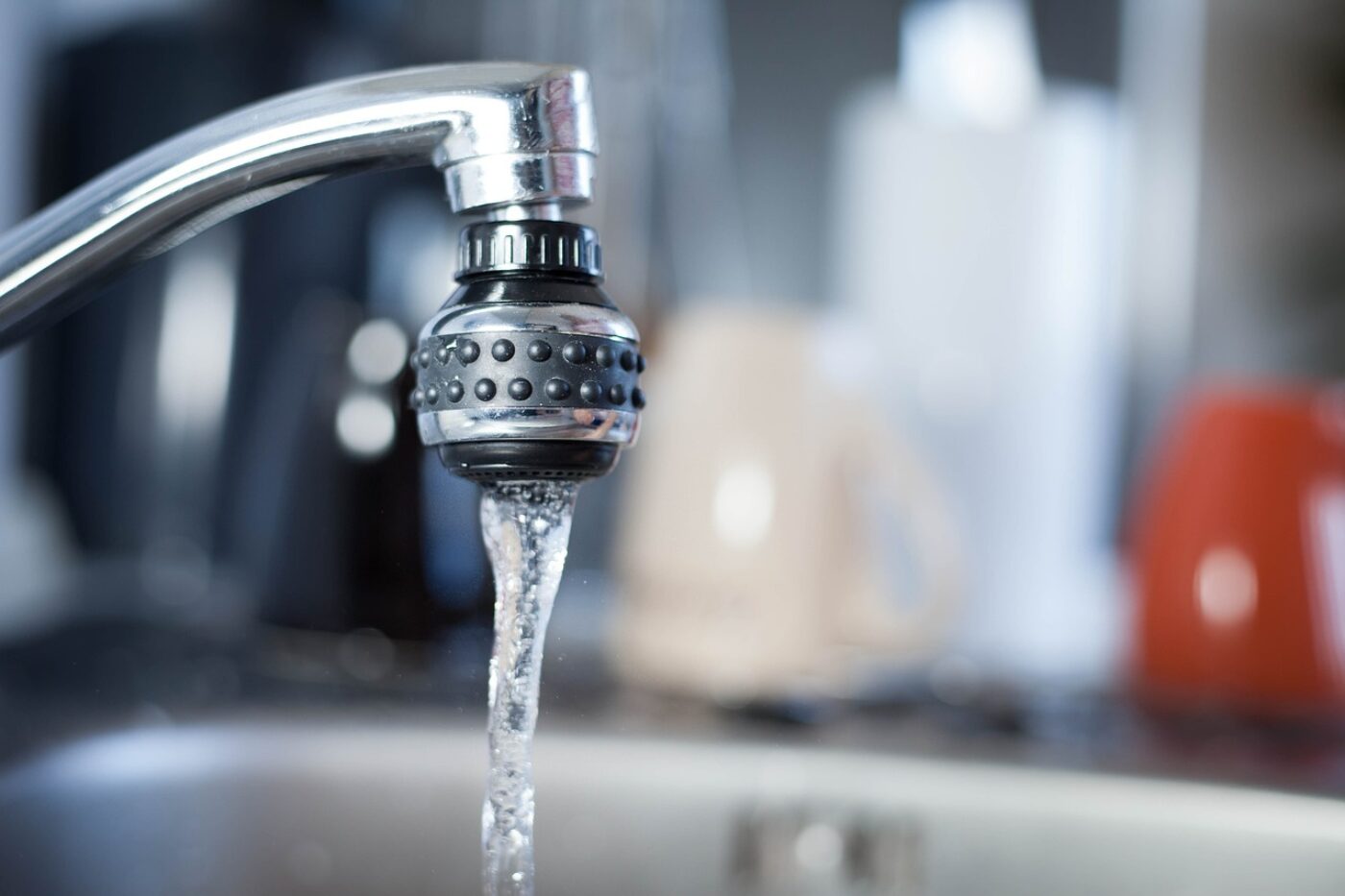 Water running from kitchen faucet.